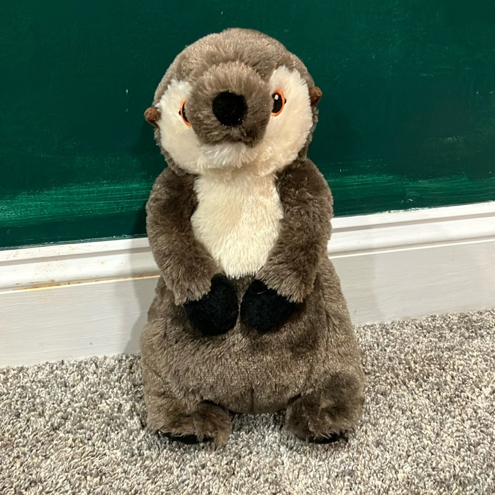 Brown and White Plush Otter Toy